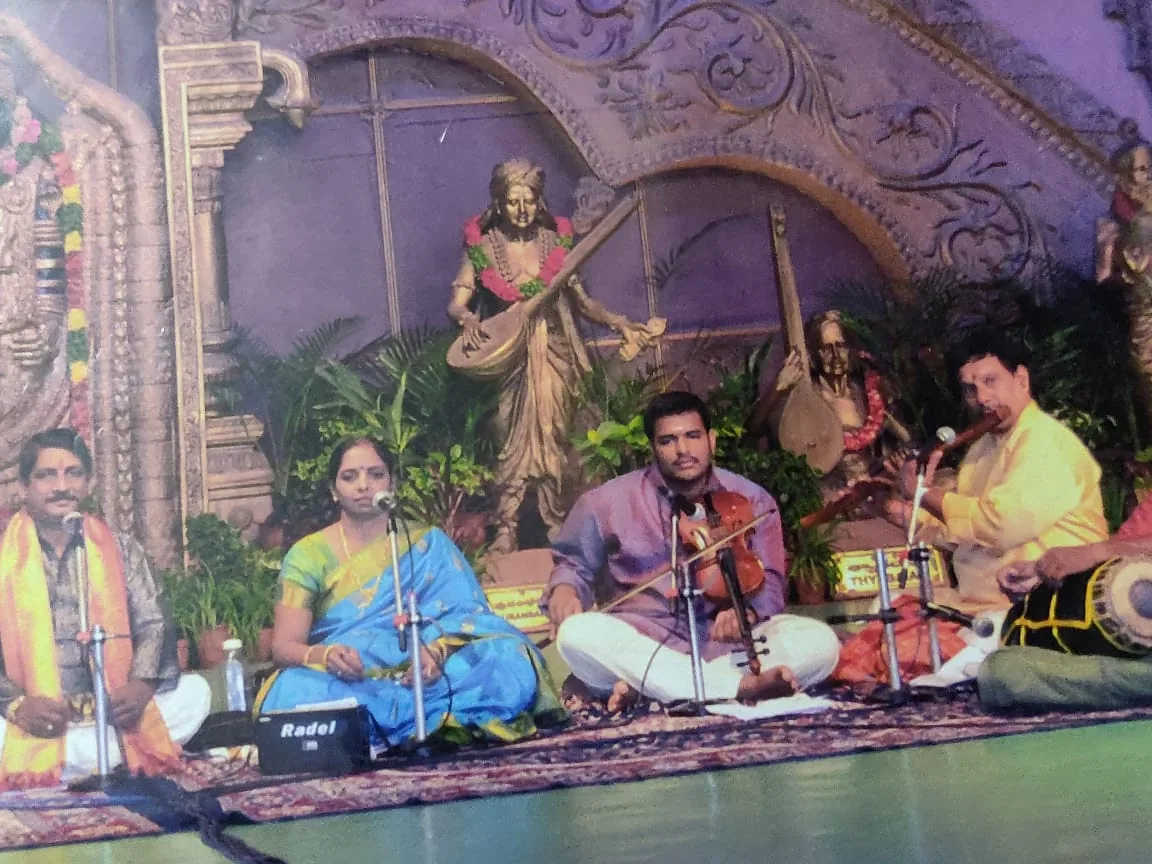 Krishnaveni performing with her accompanying musicians at a TTD concert.